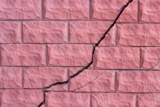 Wall Tie Failure Signs: Cracks, Bowing Walls & What to Do